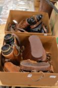 A good collection of old binoculars etc.