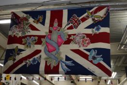 An unusual Royal Commemorative woolwork hanging made by the Rug Company.