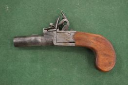 A small flintlock pocket pistol by Archer of London.