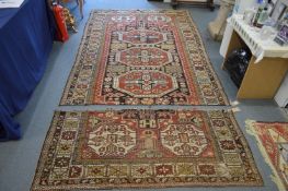 An early Persian carpet (cut in two parts).