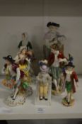 A group of porcelain figures.