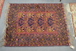 An unusual small Persian rug.