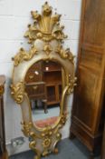 A good large decorative continental style wall mirror.