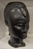 A carved Africa hardwood bust.
