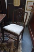 A set of six Hepplewhite design mahogany dining chairs with drop-in seats.