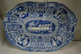 A large blue and white classical style tree and well meat dish.