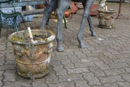 A pair of composite garden planters.
