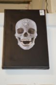 After Damien Hirst, a photographic print on canvas depicting the crystal skull.