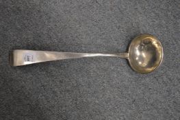 A continental white metal ladle.