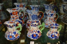 Nine Masons ironstone jugs.