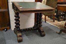 A Victorian carved oak desk.