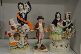 Three Staffordshire figures.