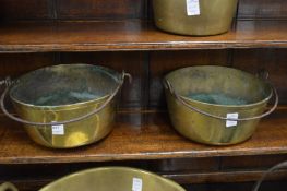 Two brass preserve pans.