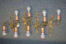 A good set of four heavy brass twin branch wall lights.