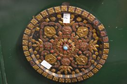 A decorative circular eastern panel.