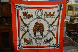 A Hermes silk scarf.
