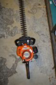 A Stihl HS45 petrol hedge trimmer.