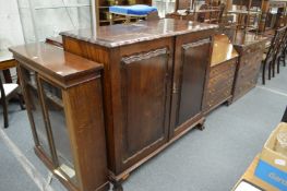 A continental mahogany two door press cupboard.