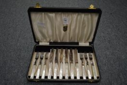 A cased set of mother-of-pearl handled fruit knives and forks.