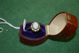 A good gold and opal ring.