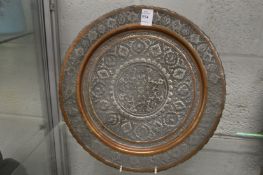 An eastern tinned metal circular dish.