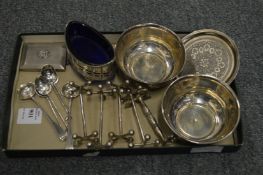 A set of four silver knife rests and other items.