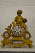 A French ormolu and porcelain mantle clock.