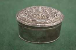 An eastern white metal snuff box.