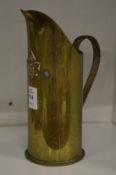 Trench art, a jug made from a shell case.
