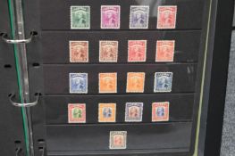 An album containing Sarawak the Rule of the White Raj.