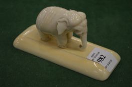 A carved model of an elephant.