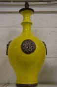 A large Chinese crackle glazed bottle shaped lamp base.