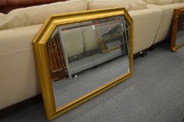 A modern gilt framed overmantle mirror.