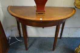 A George III design mahogany and satinwood banded dining table comprising a pair of demi-lune ends