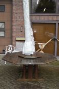 A good large octagonal hardwood garden table with lazy Susan and large cream parasol.