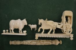 A late 19th century carved ivory items.
