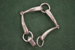 A Lisa Jenkins silver bracelet.