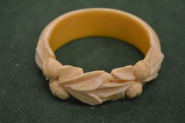 A carved bangle.