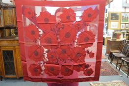 A Salvatore Ferragamo silk scarf.