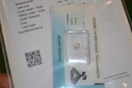 A loose diamond with certificate.