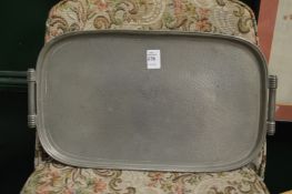 An Art Nouveau pewter tray.