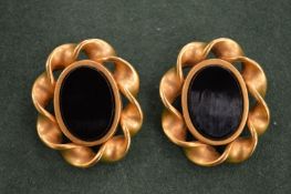 A pair of Lisa Jones gilt and black stone earrings.