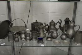 A quantity of pewter items.
