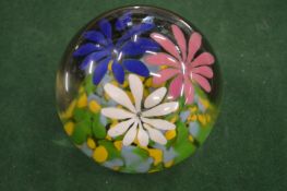 A glass paperweight.