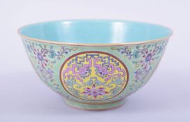A CHINESE QING STYLE PORCELAIN BOWL, the exterior with polychrome lotus / longevity calligraphy, the
