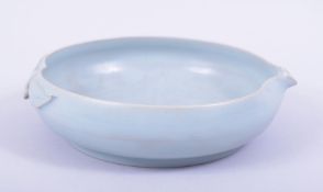 A CHINESE CELADON CIRCULAR BRUSH WASHER, with spout to rim and moulded leaves to side, 20cm