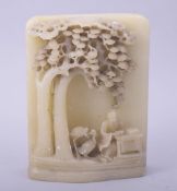 A CHINESE SOAPSTONE CARVING OF A SCRIBE sitting at a table with two storks beneath two trees, with