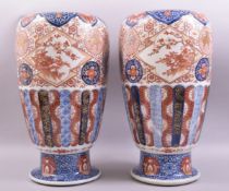 A GOOD LARGE PAIR OF JAPANESE IMARI PORCELAIN VASES, the body of each decorated in the imari palette