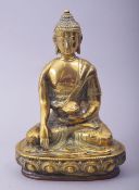 A CHINESE BRASS MODEL OF BUDDHA, 19cm high.