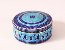 AN INDIAN ENAMELED SILVER LIDDED PILL BOX - the box with geometric banded decoration, with a